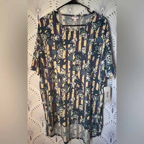 LuLaRoe Tops - Disney LuLaRoe Cream and Blue Tunic with Intricate Patterns